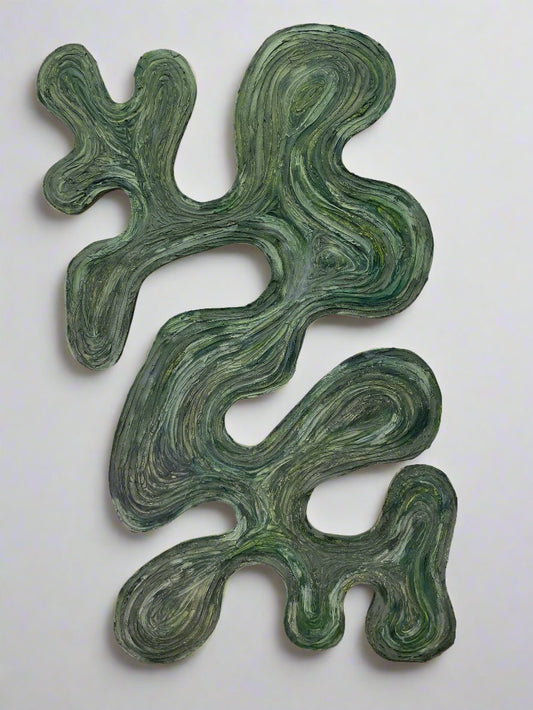 A large Abstract painting with bold strokes of turquoise, green, and and lime green highlighting the dynamic texture. This artwork is also a laser cutting